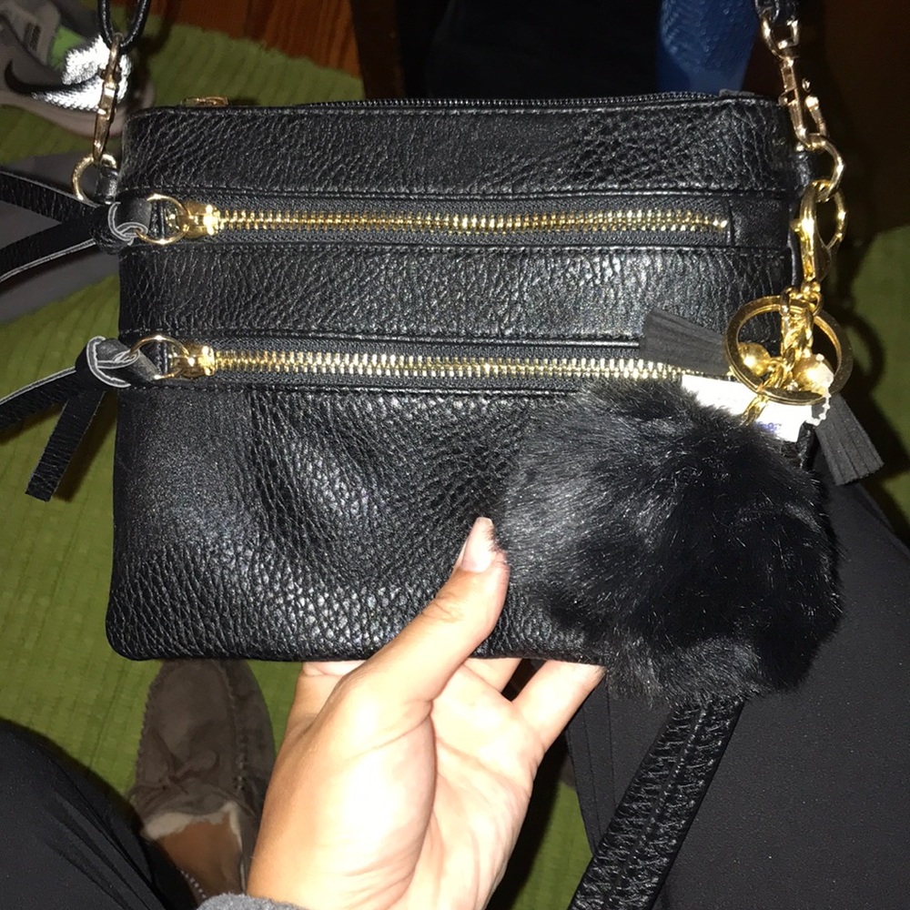 Black mini purse with Pom Pom keychain